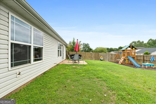 a house view with a garden space