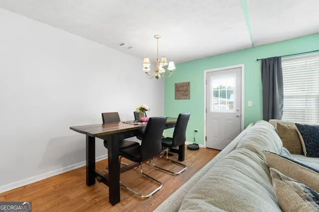 a view of a livingroom with furniture and window