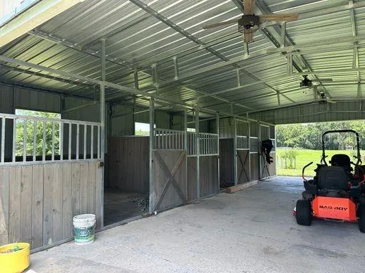 a view of a garage with a table and chairs
