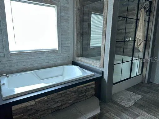 a bathroom with a sink and a bathtub
