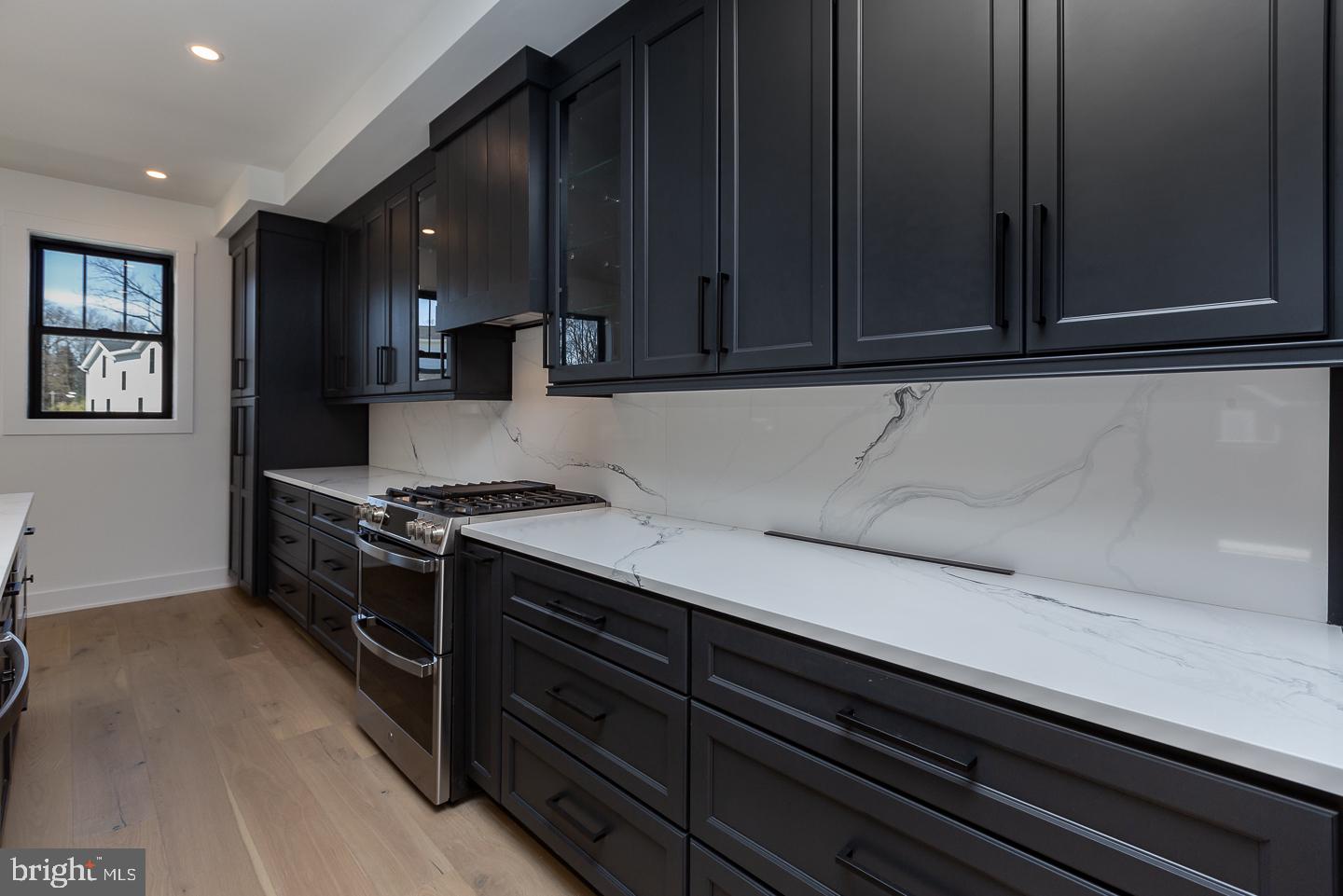 981 Henry Avenue Wayne, PA 19087 - Photo 16 of 32 Sleek modern kitchen with elegant finishes.