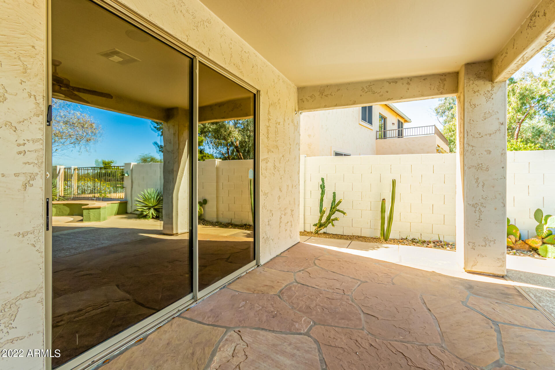 2438 East Fremont Road Phoenix, AZ 85042 - Photo 35 of 45 a view of a glass door with a outdoor space