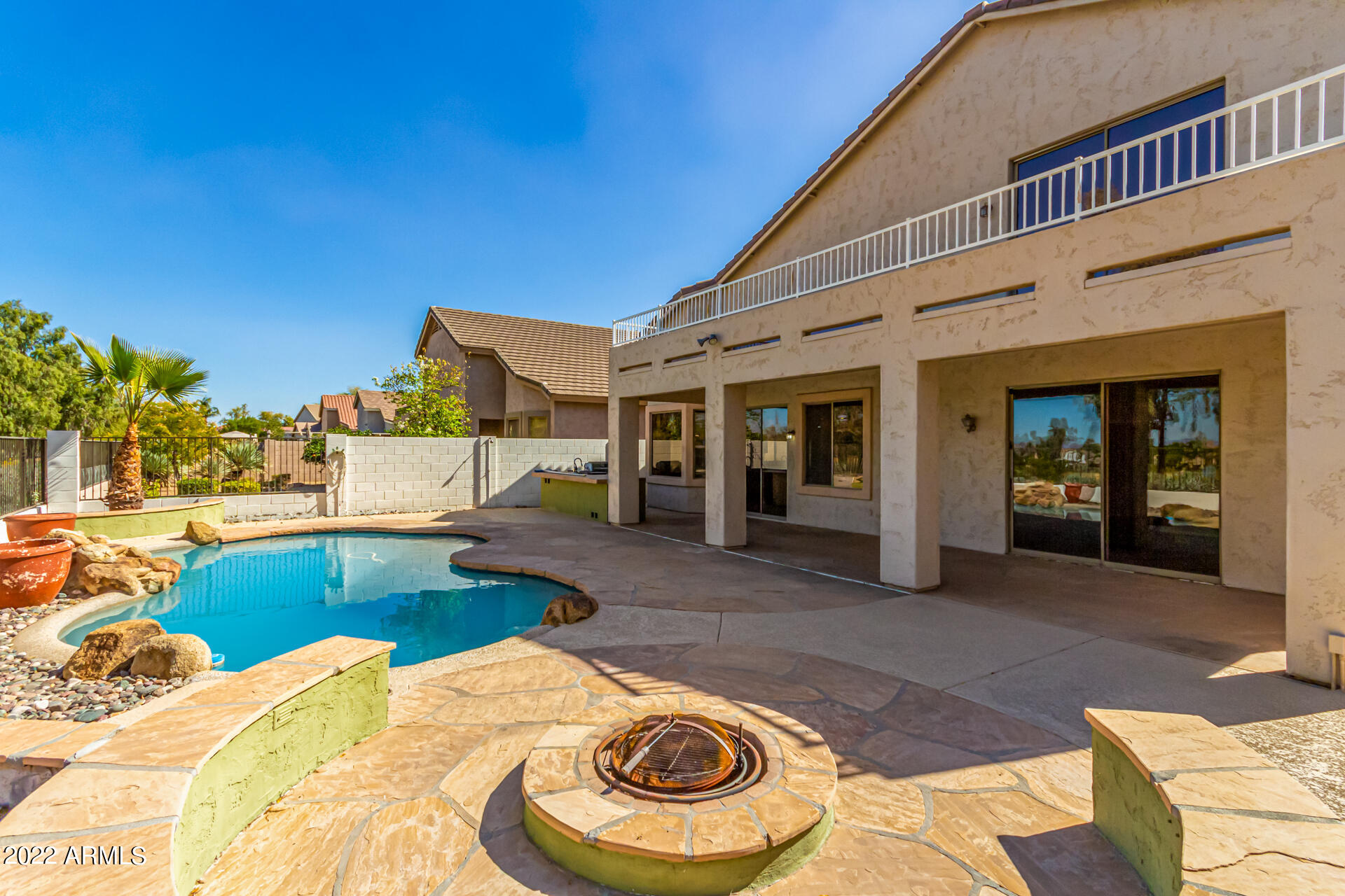 2438 East Fremont Road Phoenix, AZ 85042 - Photo 39 of 45 a view of a house with pool and a chairs