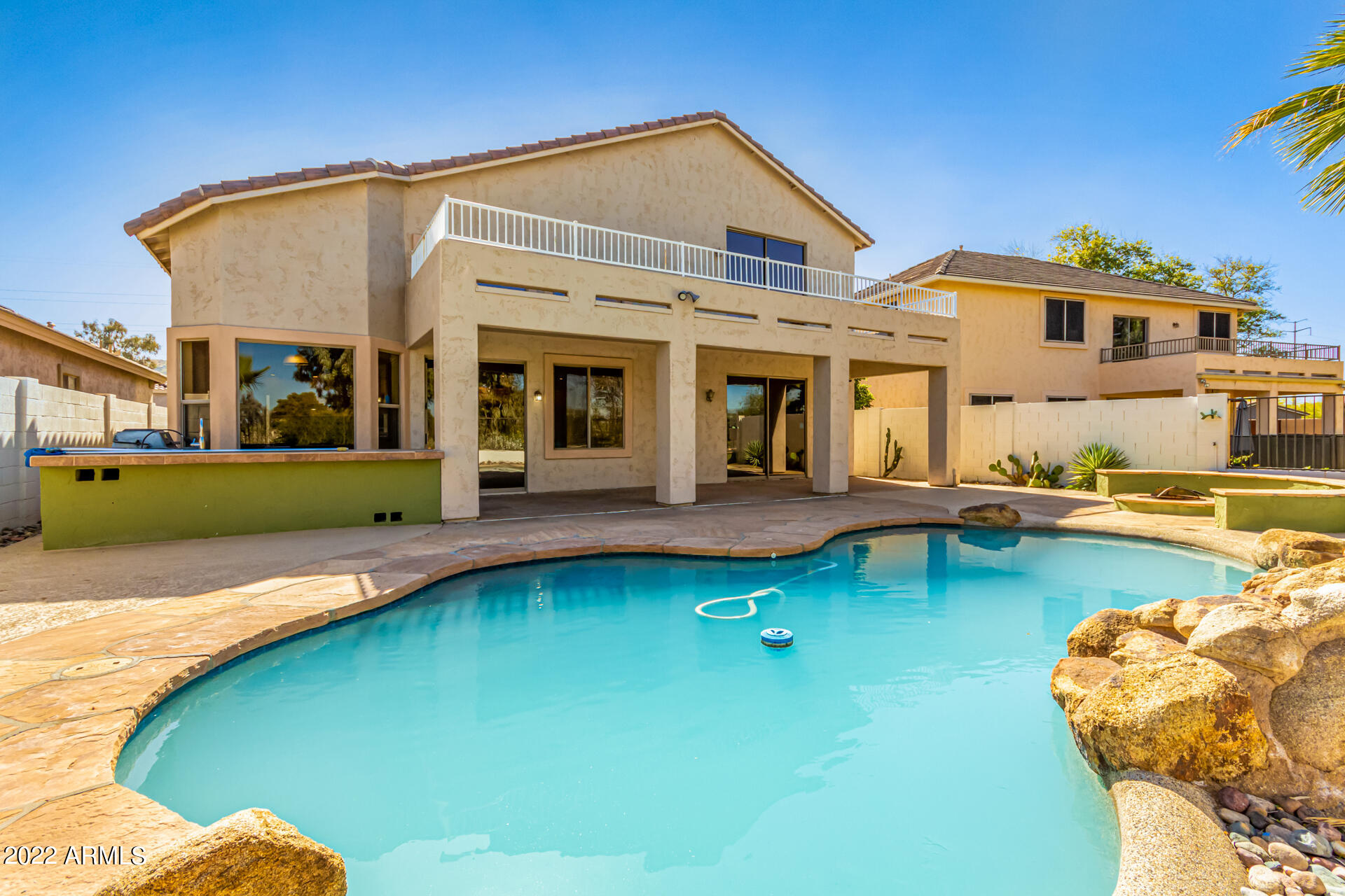 2438 East Fremont Road Phoenix, AZ 85042 - Photo 42 of 45 a view of a house with swimming pool and sitting area