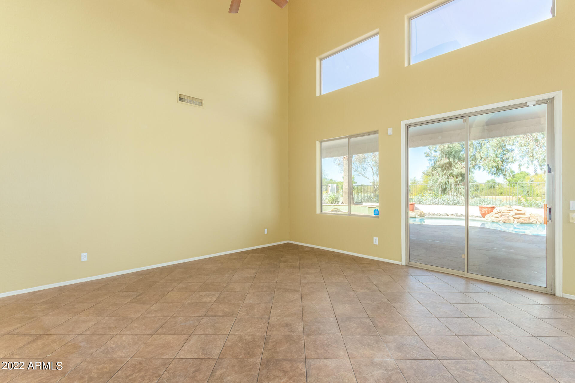 2438 East Fremont Road Phoenix, AZ 85042 - Photo 7 of 45 a view of an empty room with window