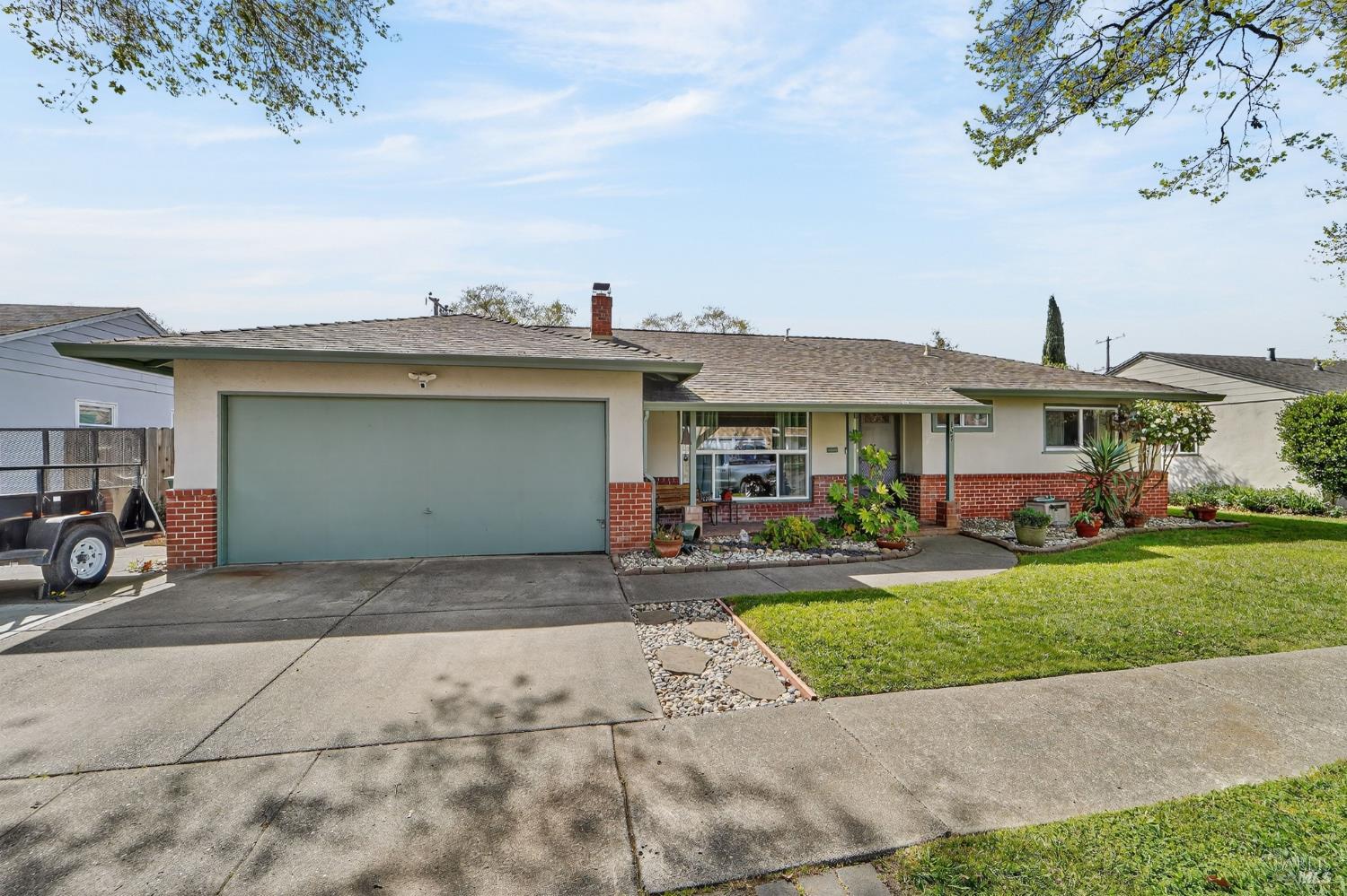 127 Jackson Way Vallejo, CA 94591 - Photo 1 of 35 a view of a house with a yard and sitting area