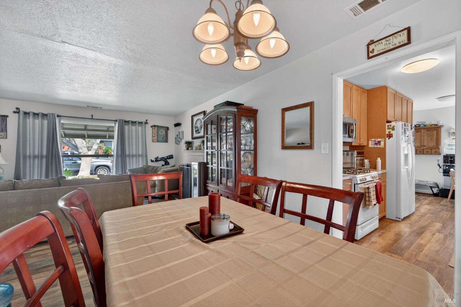 127 Jackson Way Vallejo, CA 94591 - Photo 11 of 35 a living room with furniture and a wooden floor