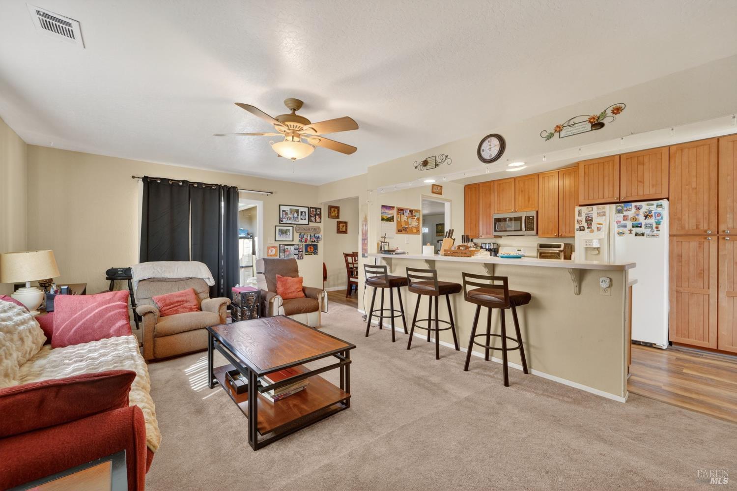 127 Jackson Way Vallejo, CA 94591 - Photo 14 of 35 a living room with furniture kitchen view and a window