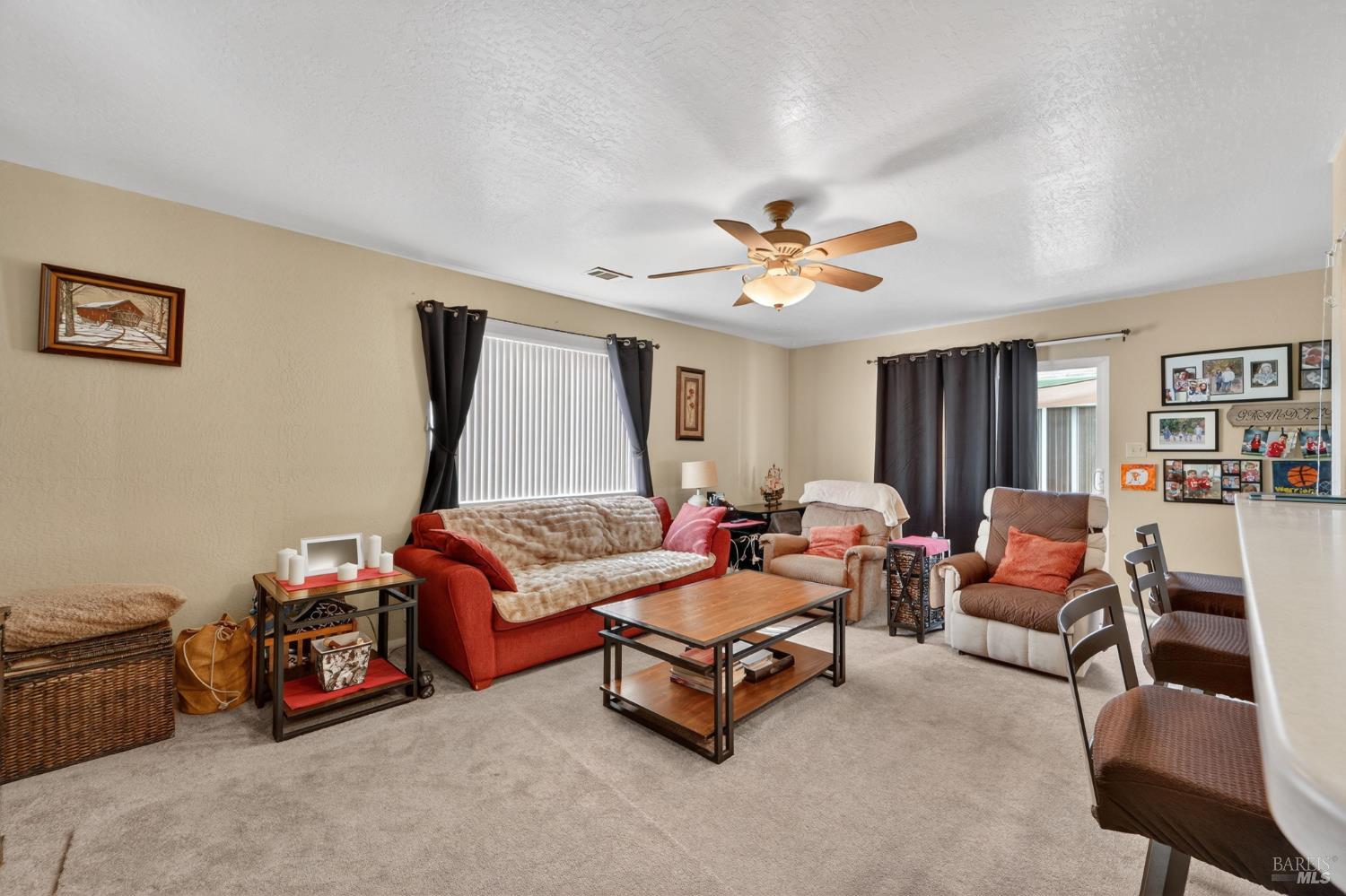 127 Jackson Way Vallejo, CA 94591 - Photo 15 of 35 a living room with furniture and a large window