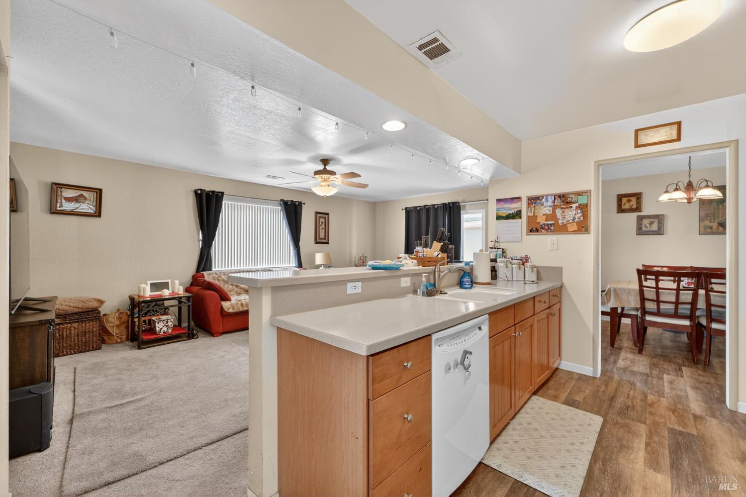 127 Jackson Way Vallejo, CA 94591 - Photo 16 of 35 a large kitchen with kitchen island a large counter space and furniture