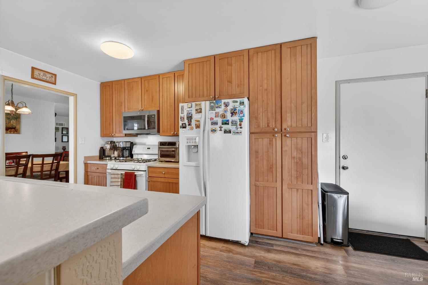 127 Jackson Way Vallejo, CA 94591 - Photo 17 of 35 a kitchen with stainless steel appliances granite countertop a refrigerator and a stove top oven