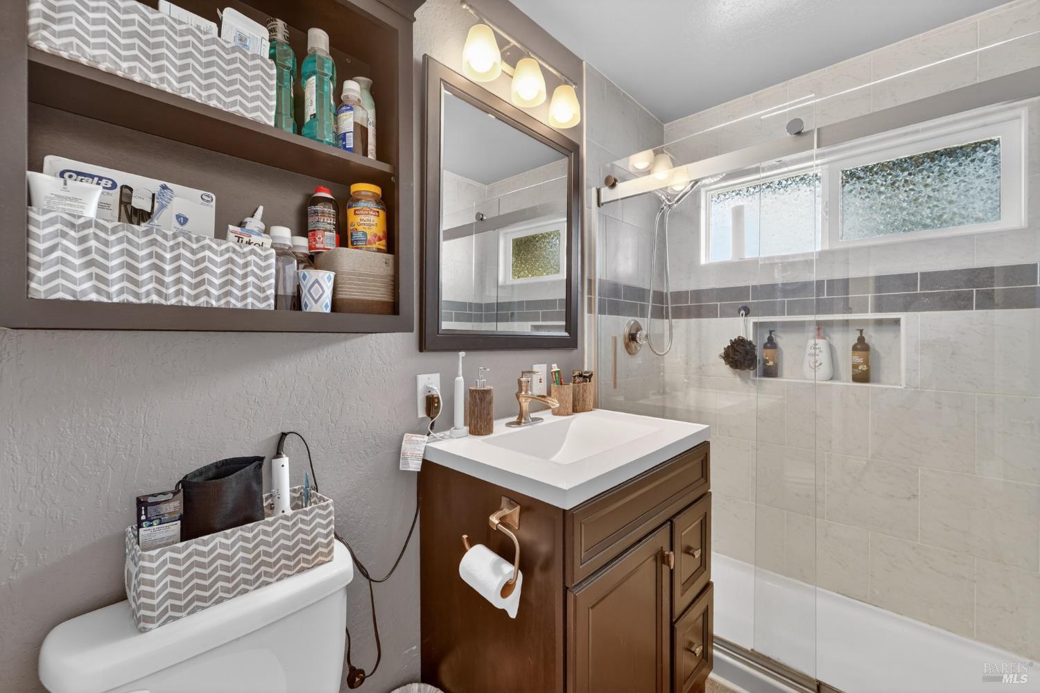 127 Jackson Way Vallejo, CA 94591 - Photo 20 of 35 a bathroom with a sink and a mirror