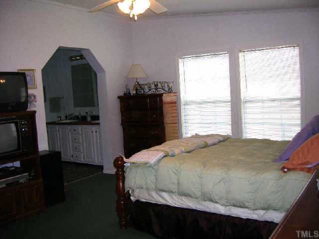 2058 Sanders Road Stem, NC 27581 - Photo 4 of 12 MASTER BEDROOM IS 16.9 X 13 FEET-GREAT AREA! TWO SEPARATE WALK-IN CLOSETS! DOUBLE WINDOWS, CEILING FAN, CARPET.