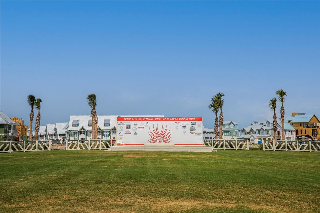 214 Sunset Avenue, Unit 2 Port Aransas, TX 78373 - Photo 28 of 37 a view of outdoor space with garden and seating area