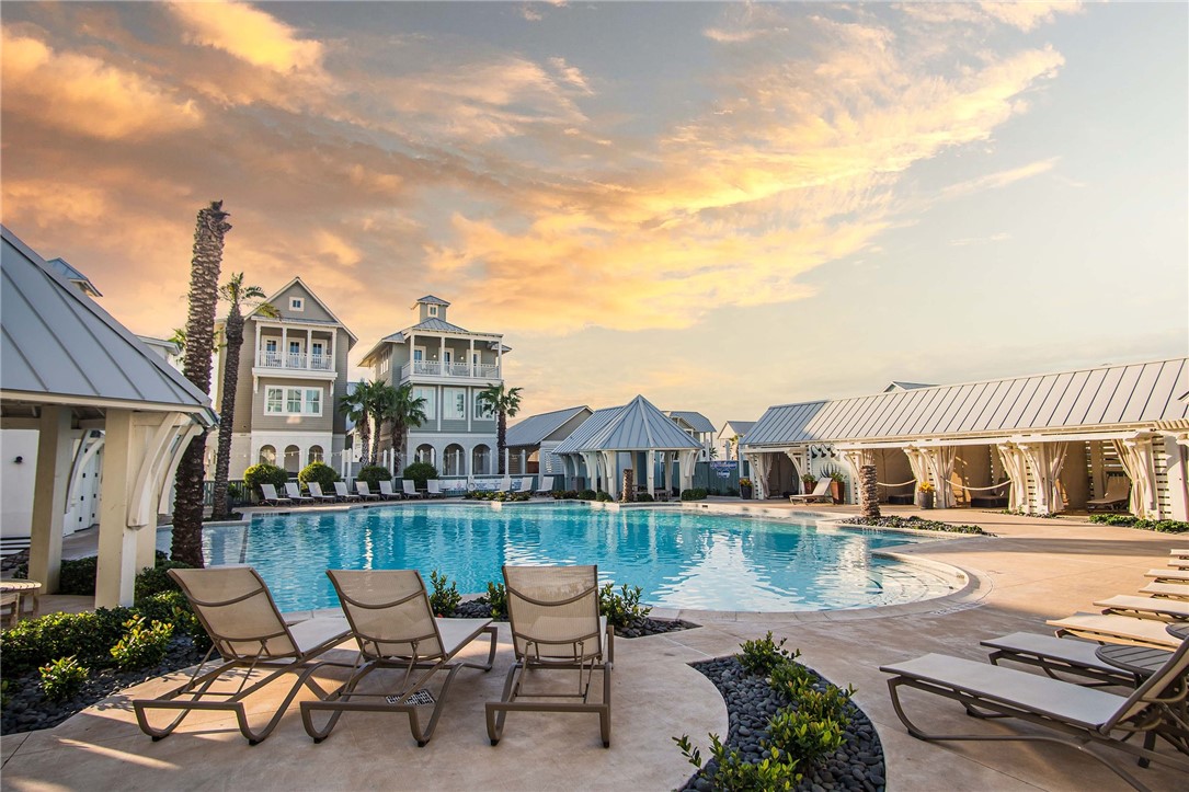 214 Sunset Avenue, Unit 2 Port Aransas, TX 78373 - Photo 36 of 37 a view of a lake with a terrace