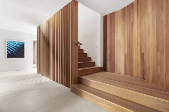 a bathroom with a bathtub and a sink
