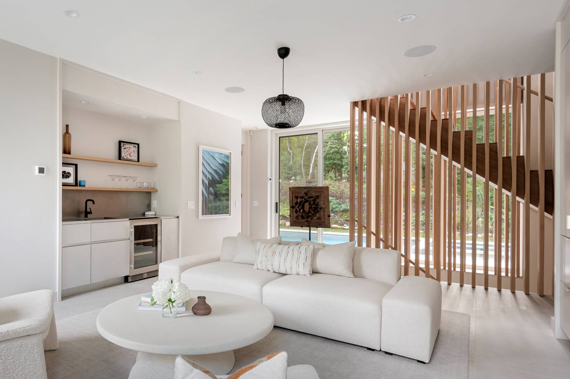 232 Kings Point Road East Hampton, NY 11937 - Photo 17 of 37 a living room with furniture and a wooden floor
