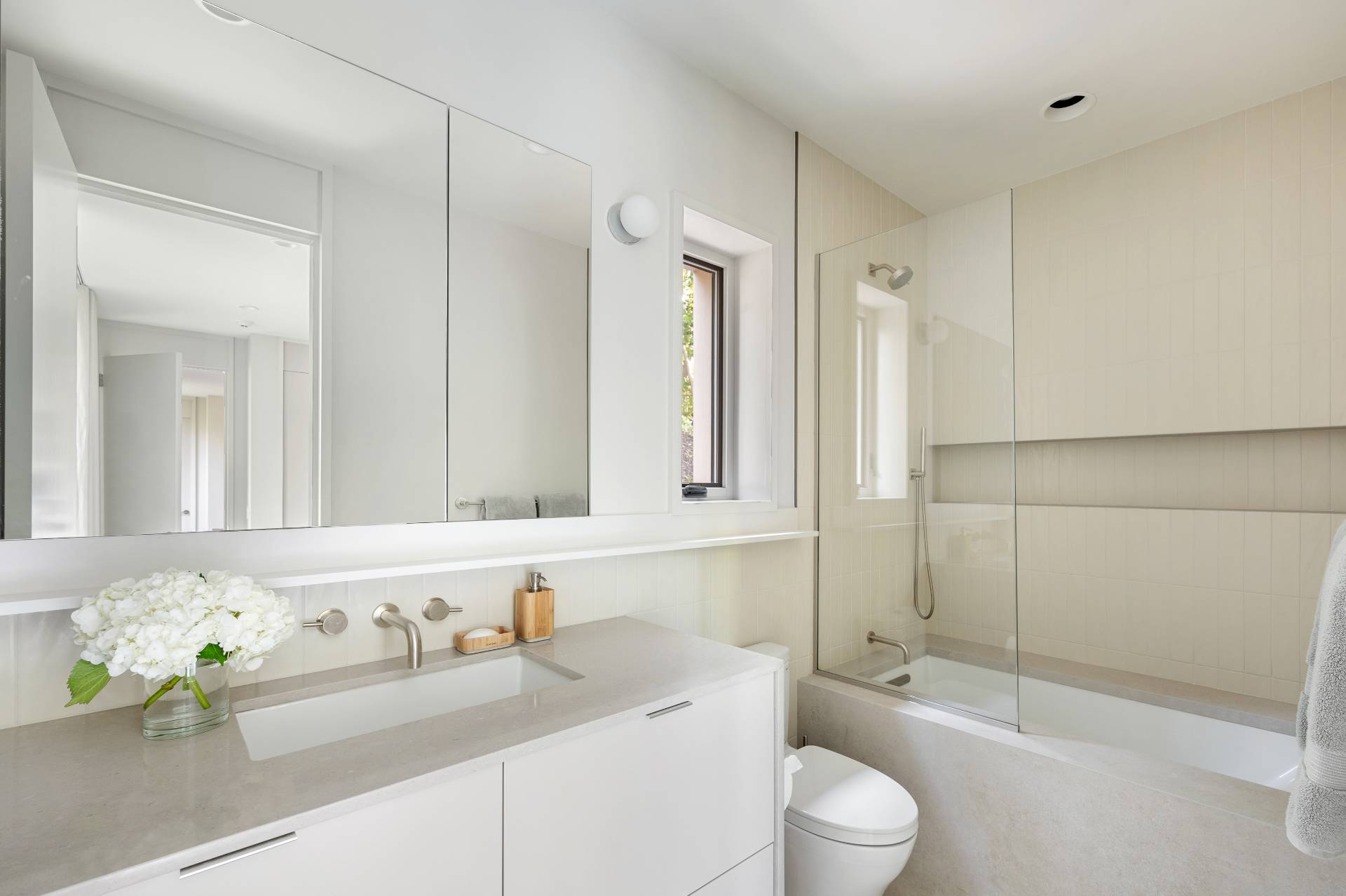 232 Kings Point Road East Hampton, NY 11937 - Photo 21 of 37 a bathroom with a granite countertop sink a toilet and a mirror