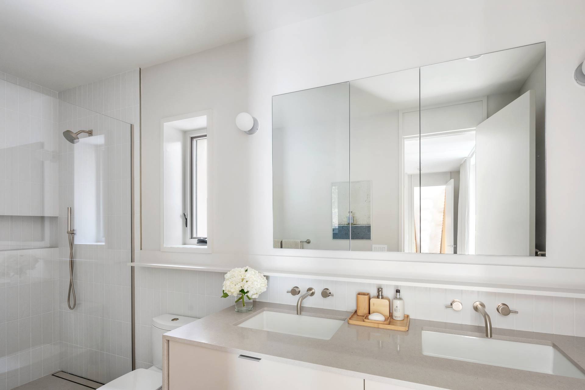 232 Kings Point Road East Hampton, NY 11937 - Photo 23 of 37 a bathroom with a sink and a mirror
