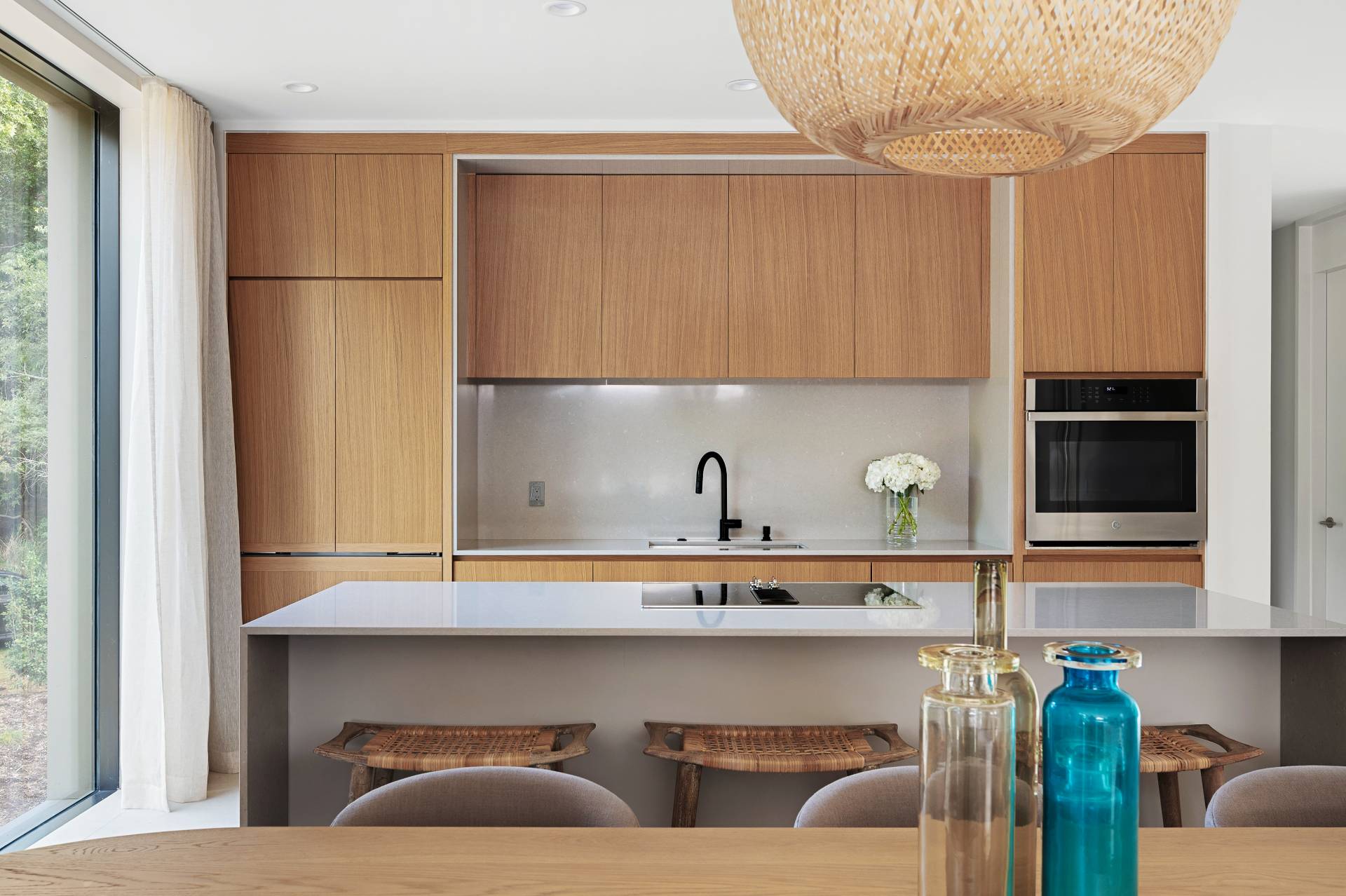 232 Kings Point Road East Hampton, NY 11937 - Photo 4 of 37 a kitchen with a sink and cabinets