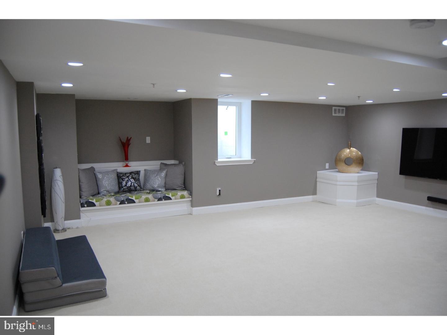 28 Madison Way Downingtown, PA 19335 - Photo 14 of 44 a living room with furniture and a flat screen tv