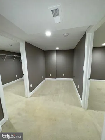 a view of a hall with an empty space