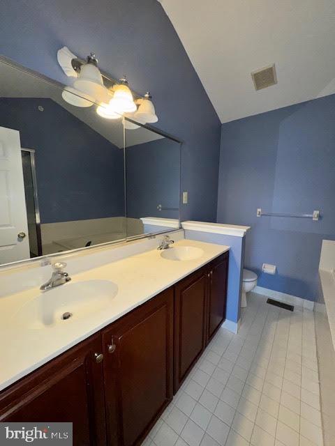 28 Madison Way Downingtown, PA 19335 - Photo 36 of 44 a bathroom with a sink and a mirror