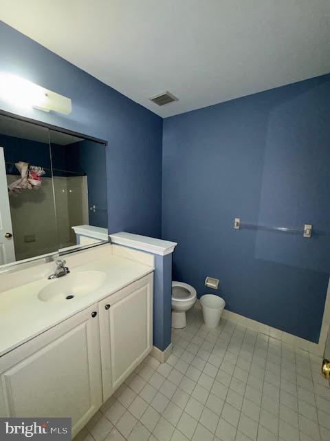 28 Madison Way Downingtown, PA 19335 - Photo 37 of 44 a bathroom with a sink a toilet and mirror