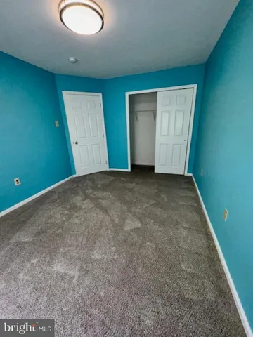 a view of entryway with stairs