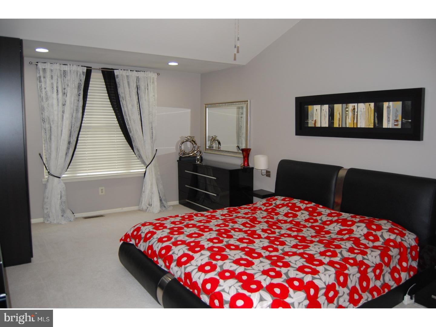 28 Madison Way Downingtown, PA 19335 - Photo 10 of 44 a bedroom with a bed and a dresser