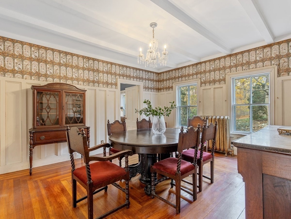 12 Spring Street Foxboro, MA 02035 - Photo 13 of 42 a view of a dining room with furniture window and wooden floor