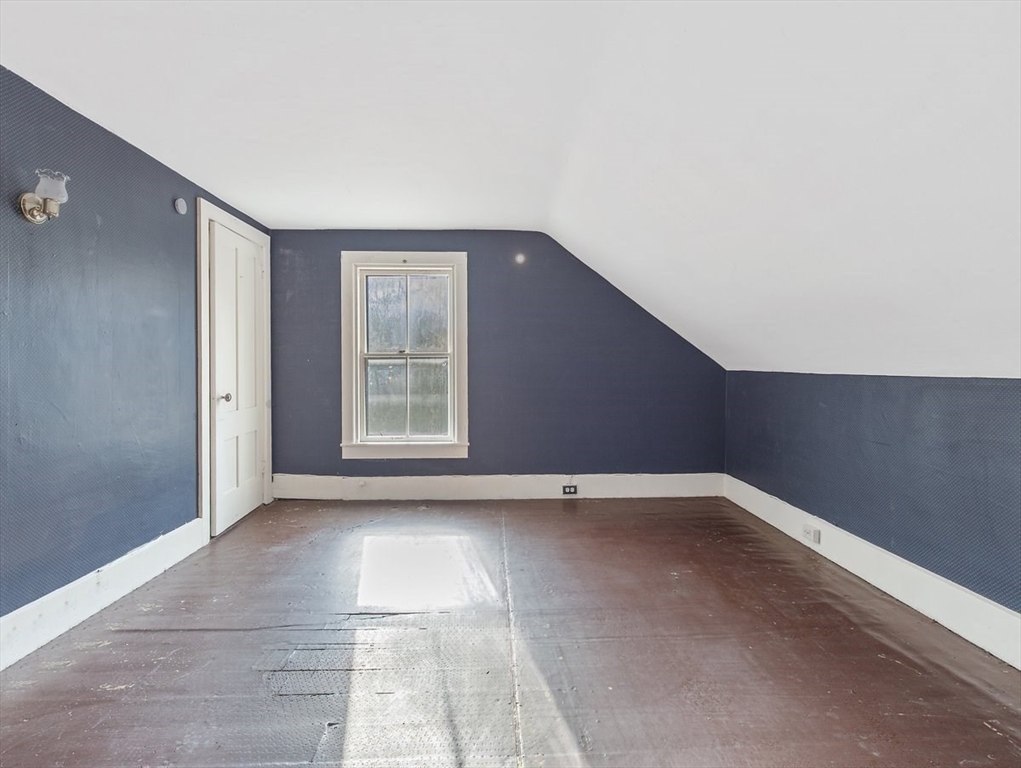 12 Spring Street Foxboro, MA 02035 - Photo 30 of 42 a view of an empty room with a window