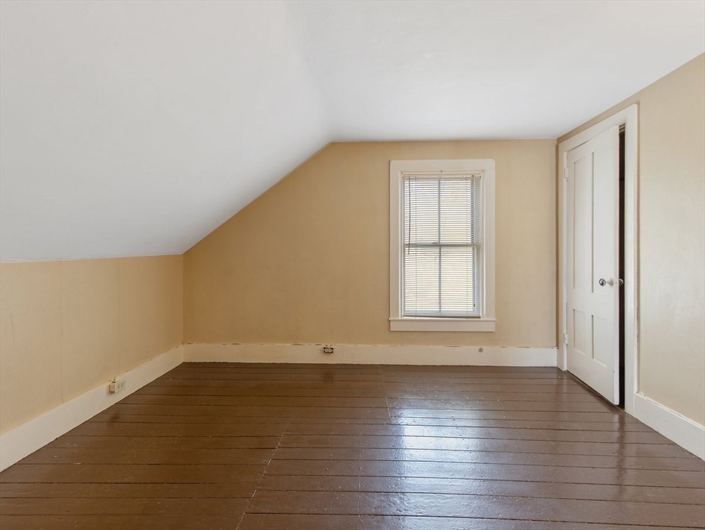12 Spring Street Foxboro, MA 02035 - Photo 31 of 42 wooden floor in an empty room with a window