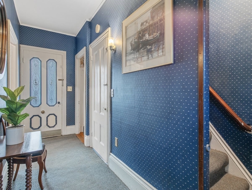12 Spring Street Foxboro, MA 02035 - Photo 5 of 42 a view of an entryway with wooden floor