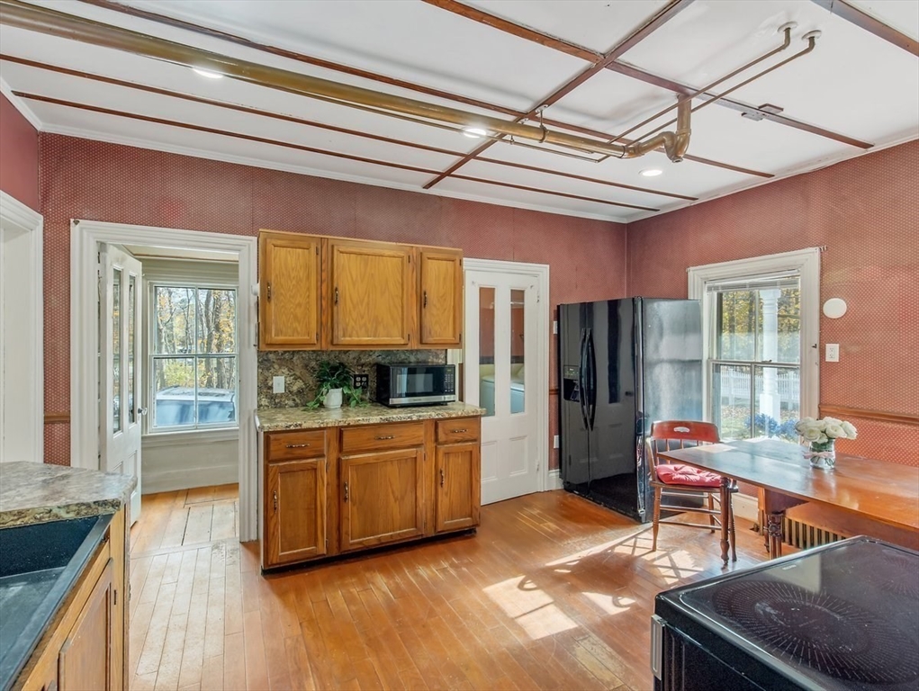 12 Spring Street Foxboro, MA 02035 - Photo 8 of 42 a room with furniture and large windows