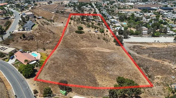 a view of a house with a yard and chair