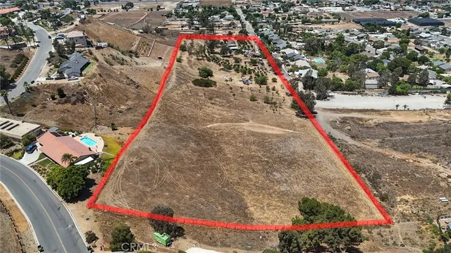 a view of a house with a yard and chair