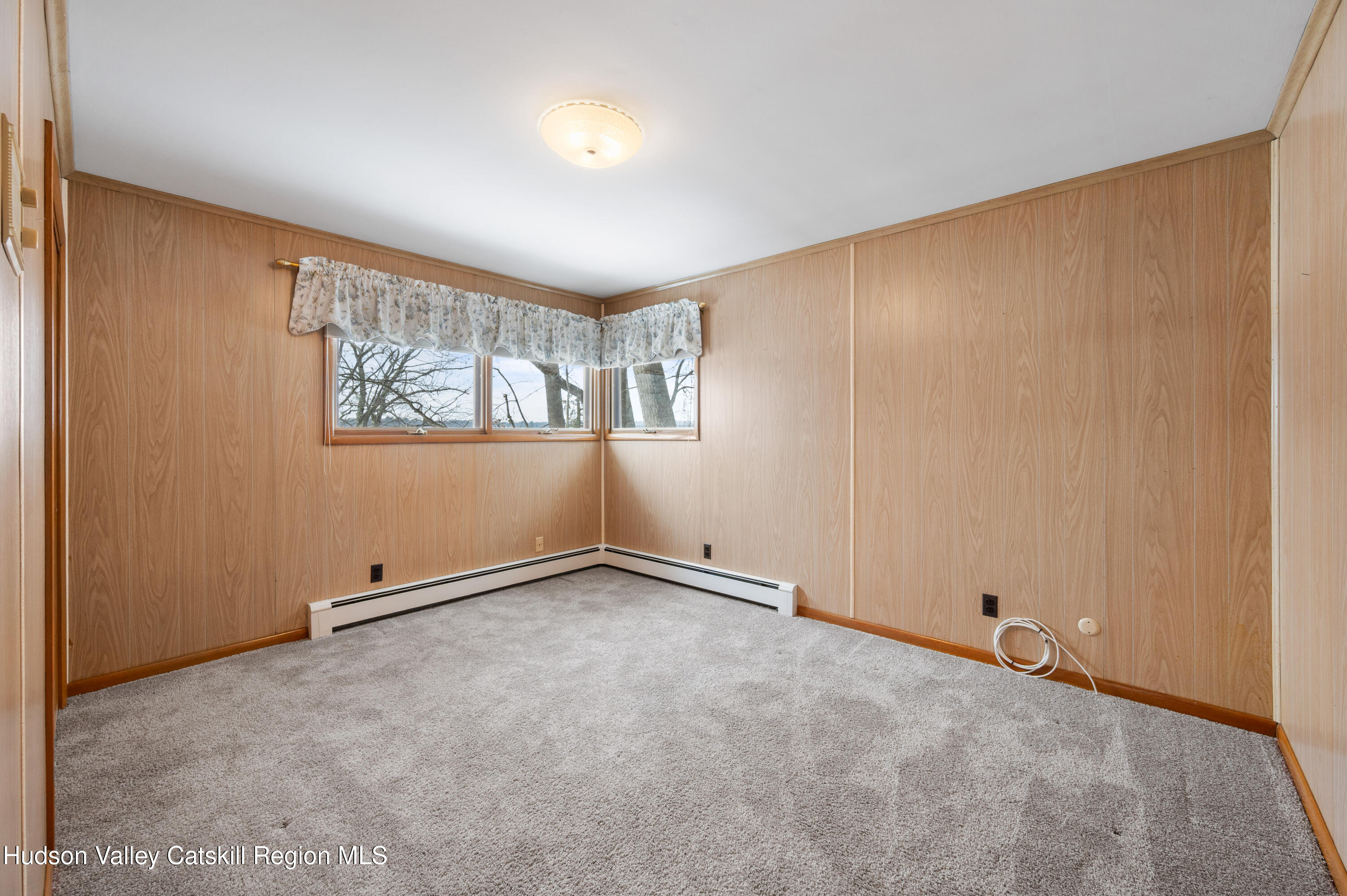 108 River Road Ulster Park, NY 12487 - Photo 11 of 32 an empty room with windows