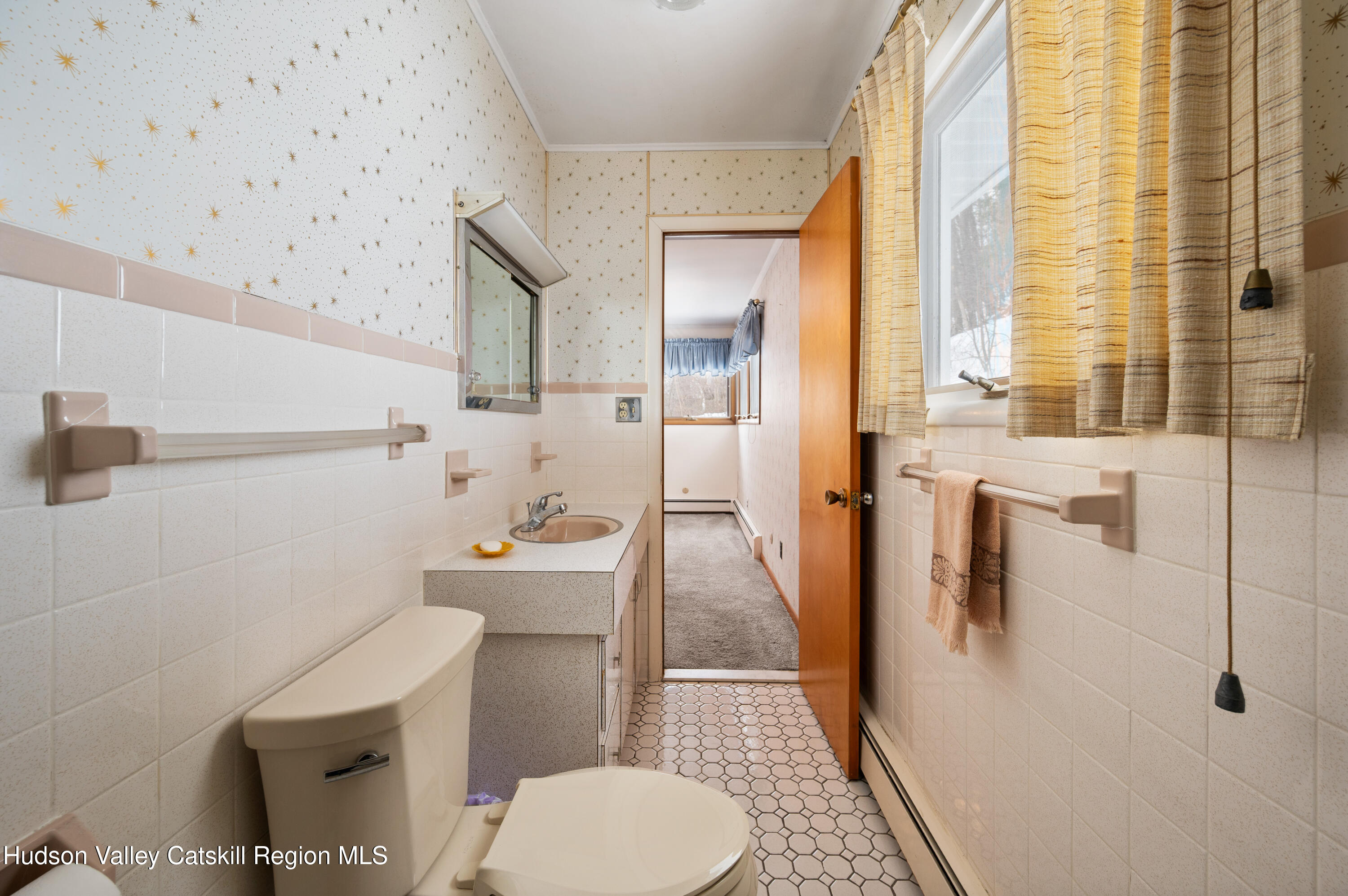 108 River Road Ulster Park, NY 12487 - Photo 15 of 32 a bathroom with a sink toilet and shower