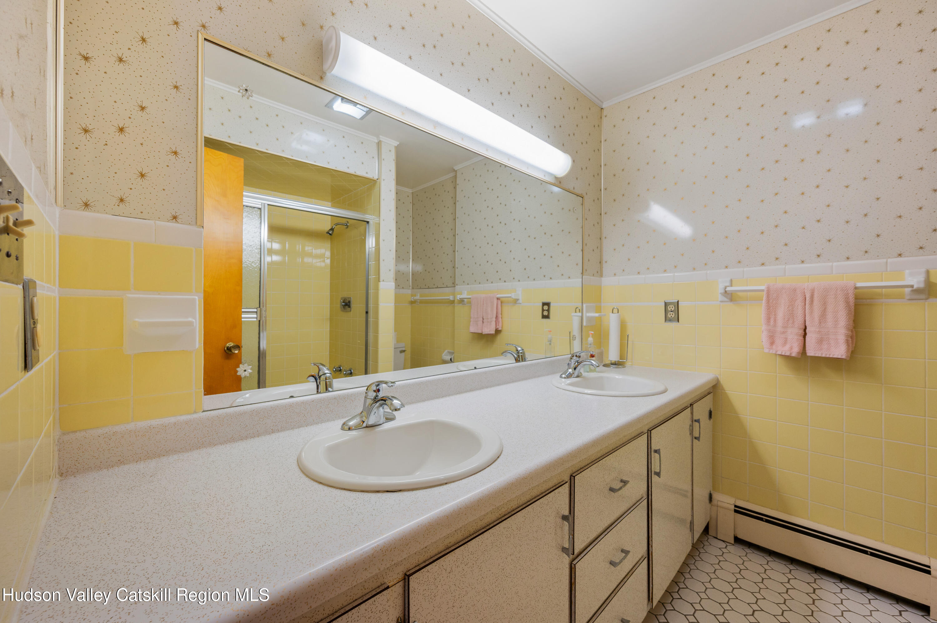 108 River Road Ulster Park, NY 12487 - Photo 19 of 32 a bathroom with a sink and a mirror