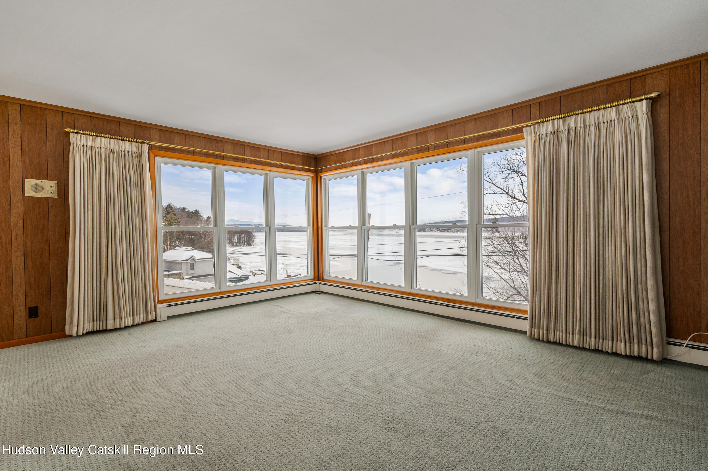 108 River Road Ulster Park, NY 12487 - Photo 3 of 32 a view of an empty room with a fireplace