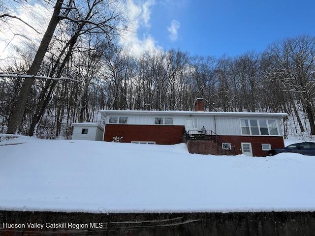 108 River Road Ulster Park, NY 12487 - Photo 31 of 32 a view of outdoor space with swimming pool and trees in the background