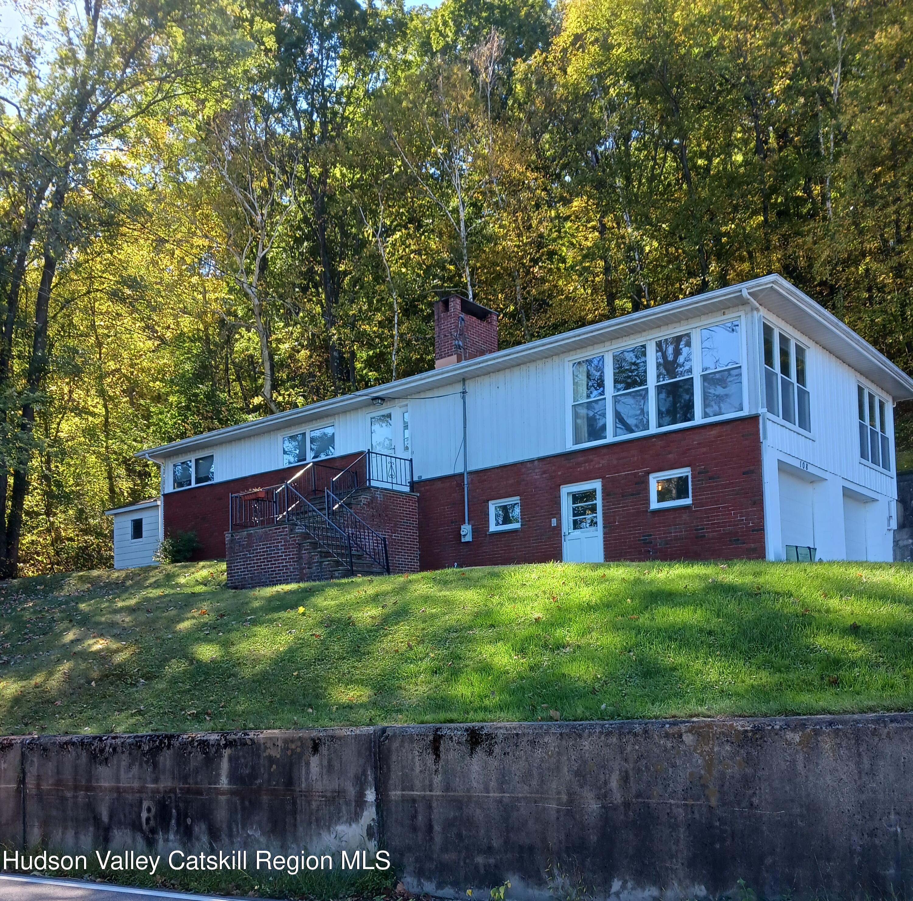 108 River Road Ulster Park, NY 12487 - Photo 32 of 32 a view of a house with a yard