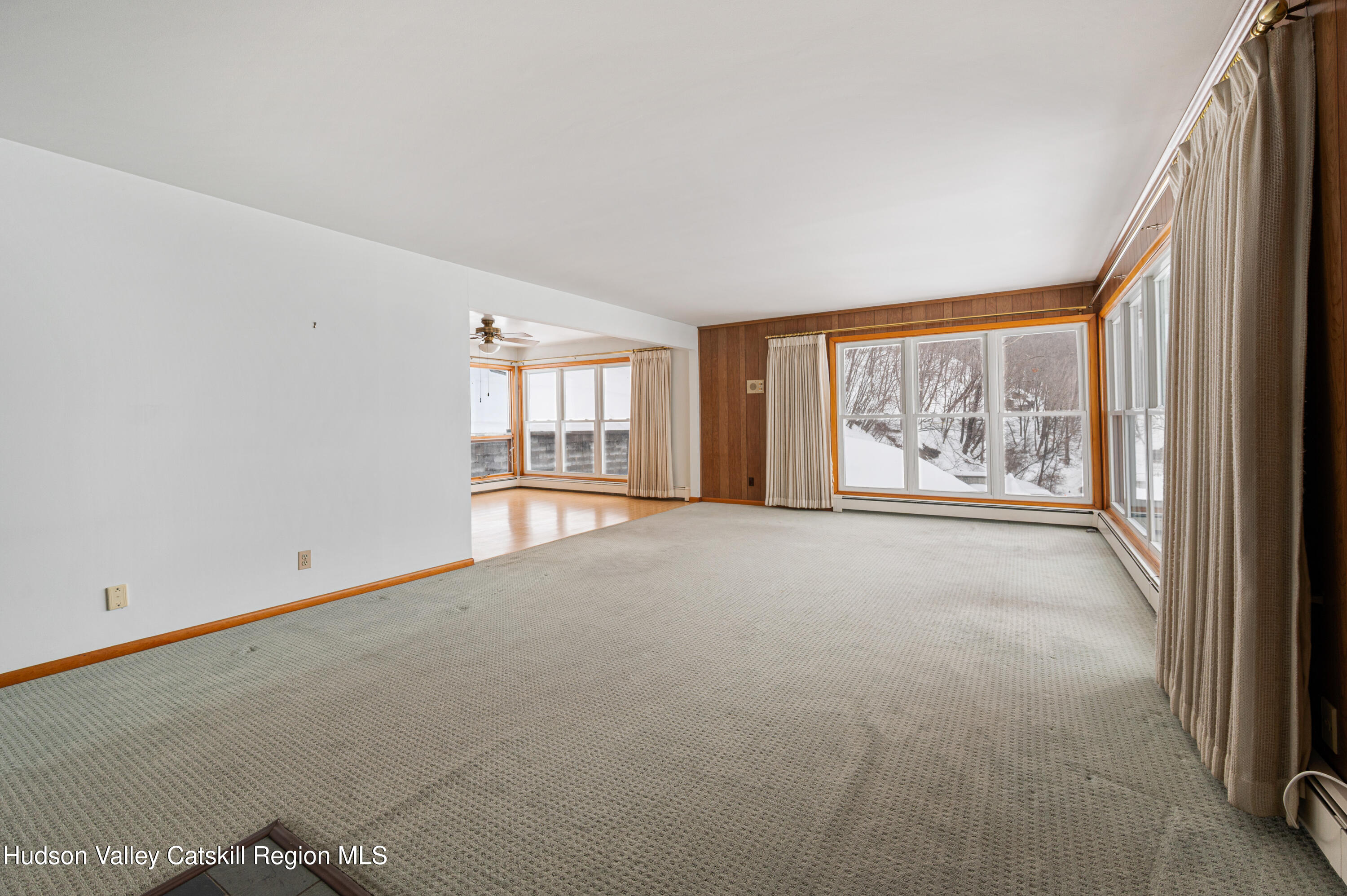 108 River Road Ulster Park, NY 12487 - Photo 5 of 32 an empty room with windows