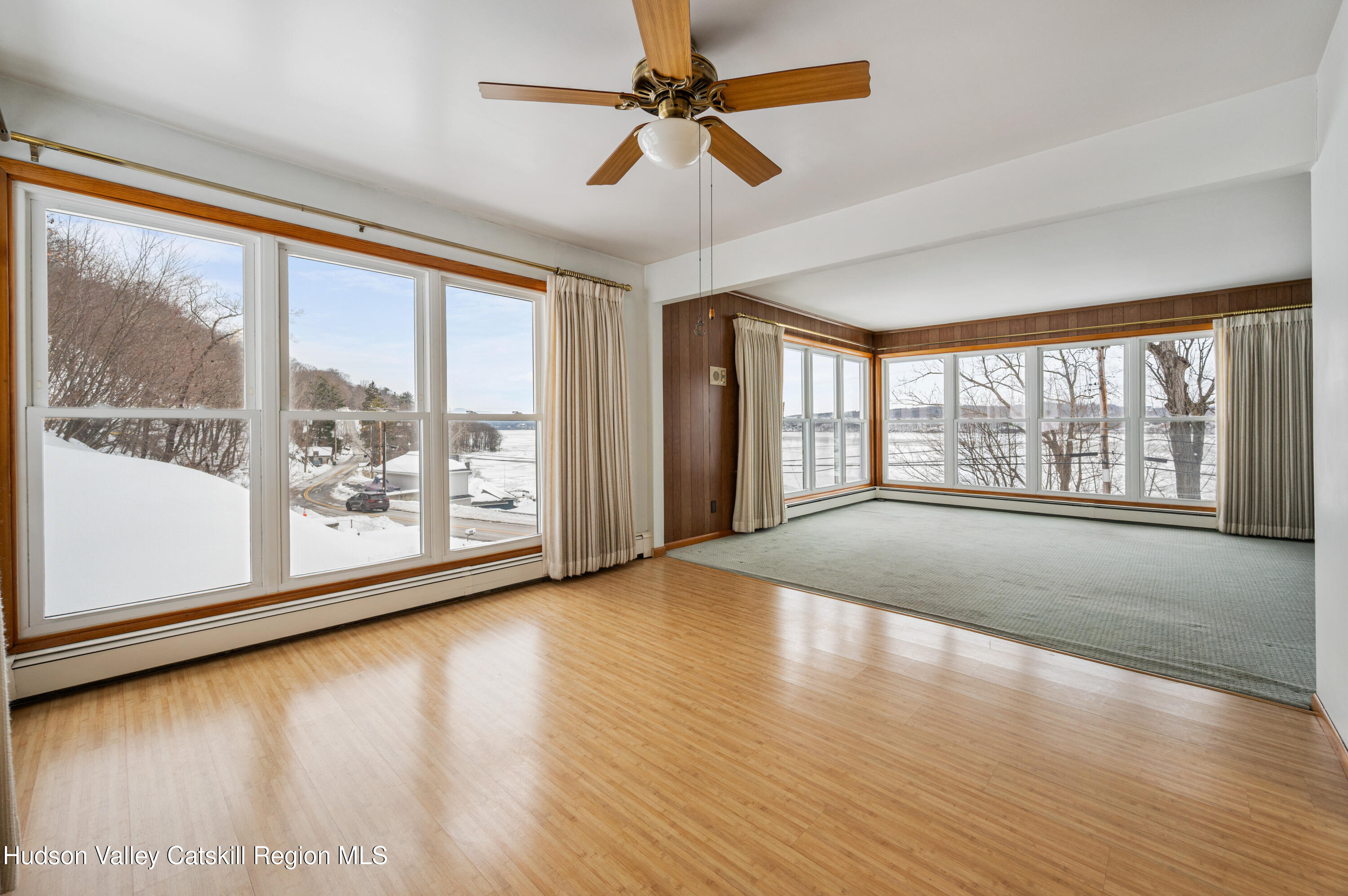 108 River Road Ulster Park, NY 12487 - Photo 7 of 32 wooden floor in an empty room with a window