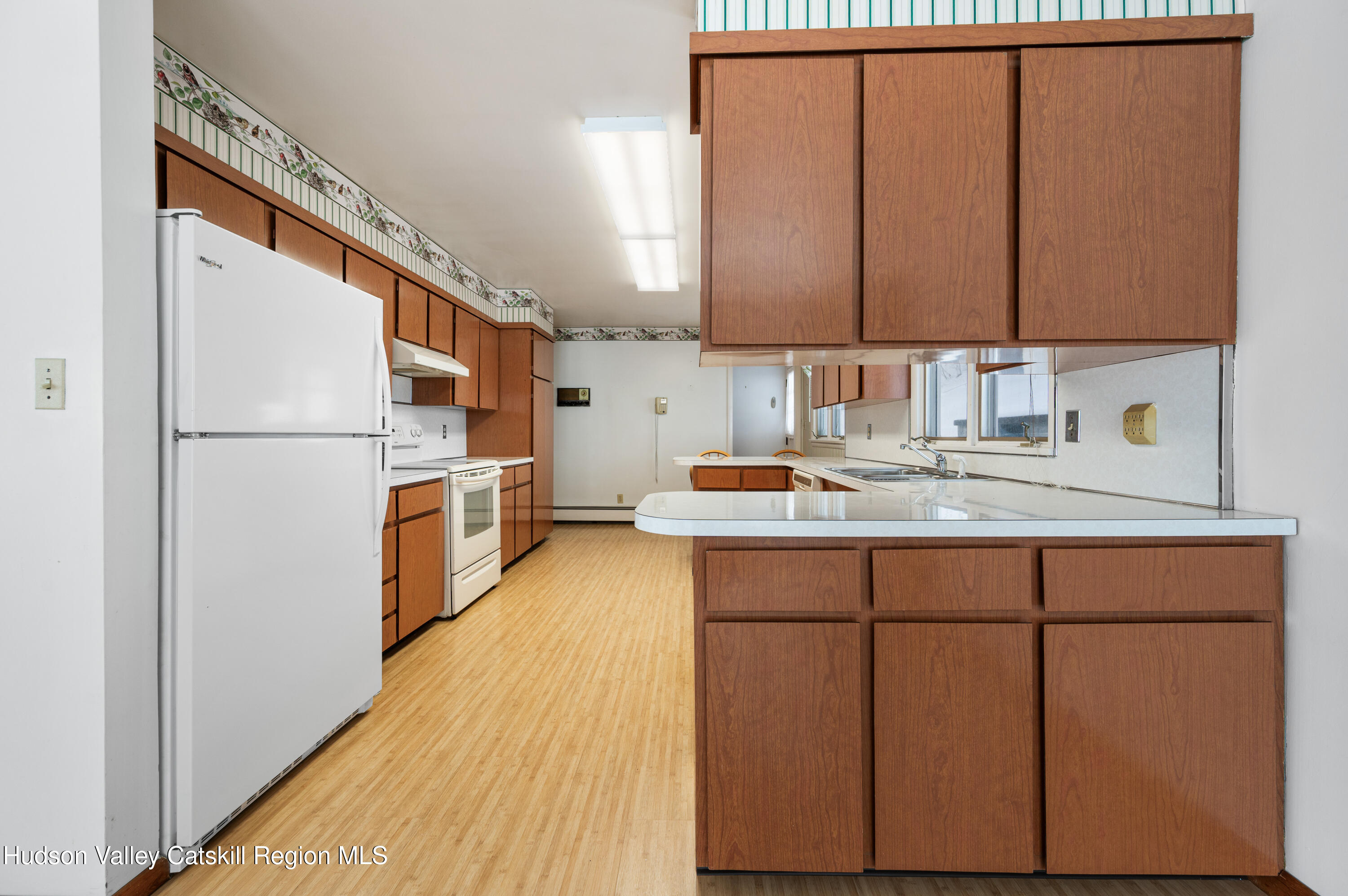 108 River Road Ulster Park, NY 12487 - Photo 8 of 32 a kitchen with sink cabinets and stainless steel appliances