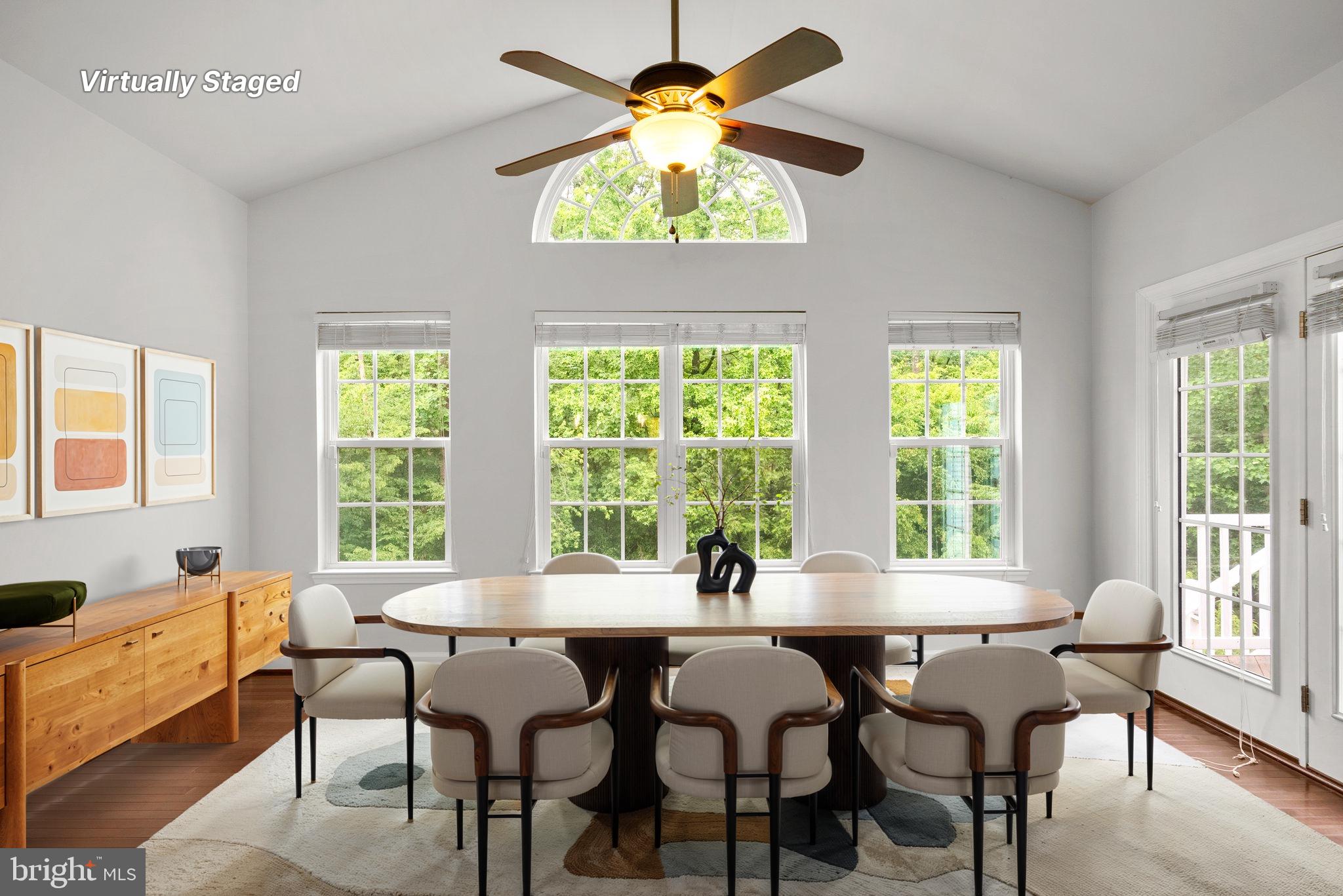 8304 Cedarview Court Clinton, MD 20735 - Photo 15 of 39 a dining room with furniture and a large window