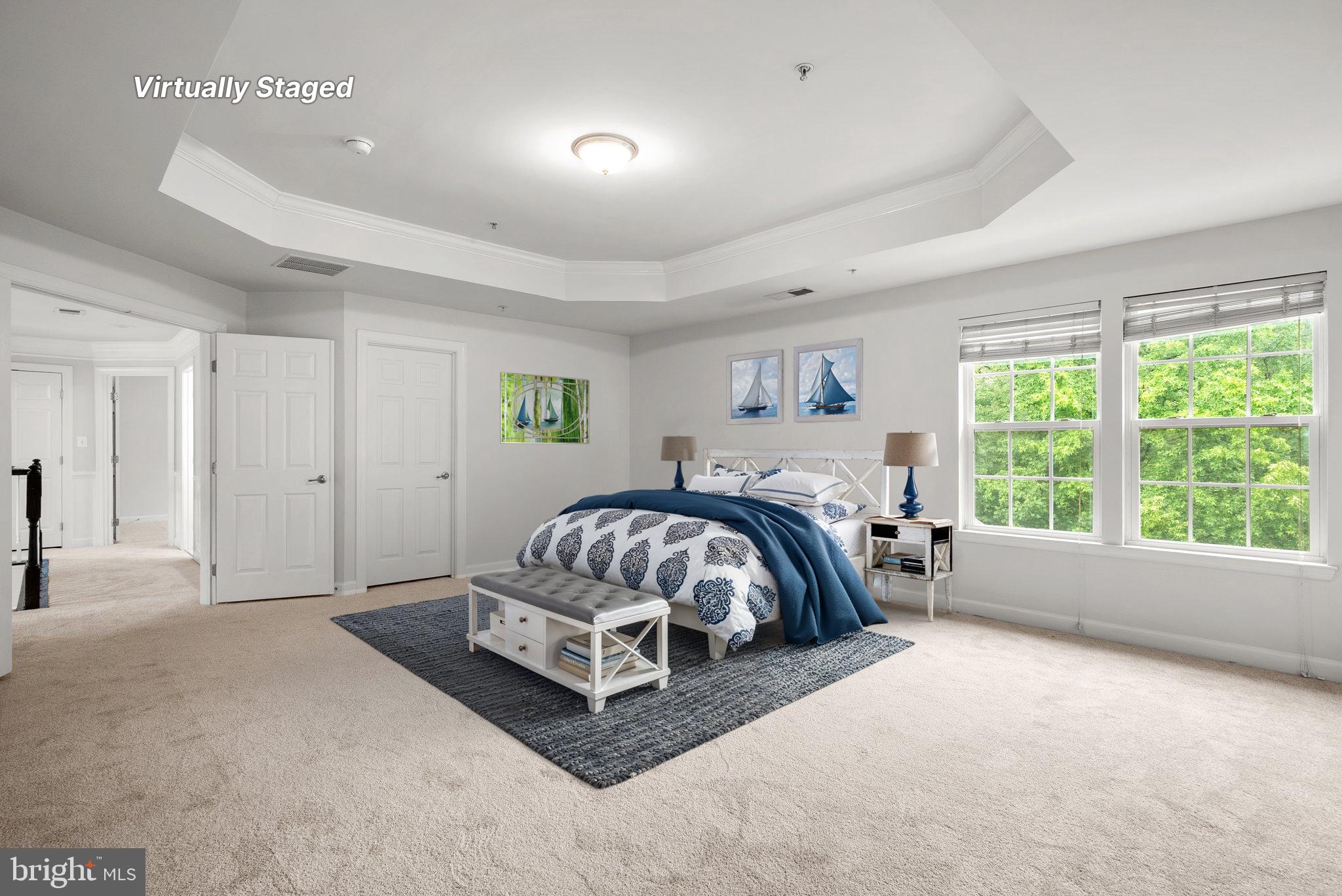 8304 Cedarview Court Clinton, MD 20735 - Photo 19 of 39 a spacious bedroom with a bed and a window