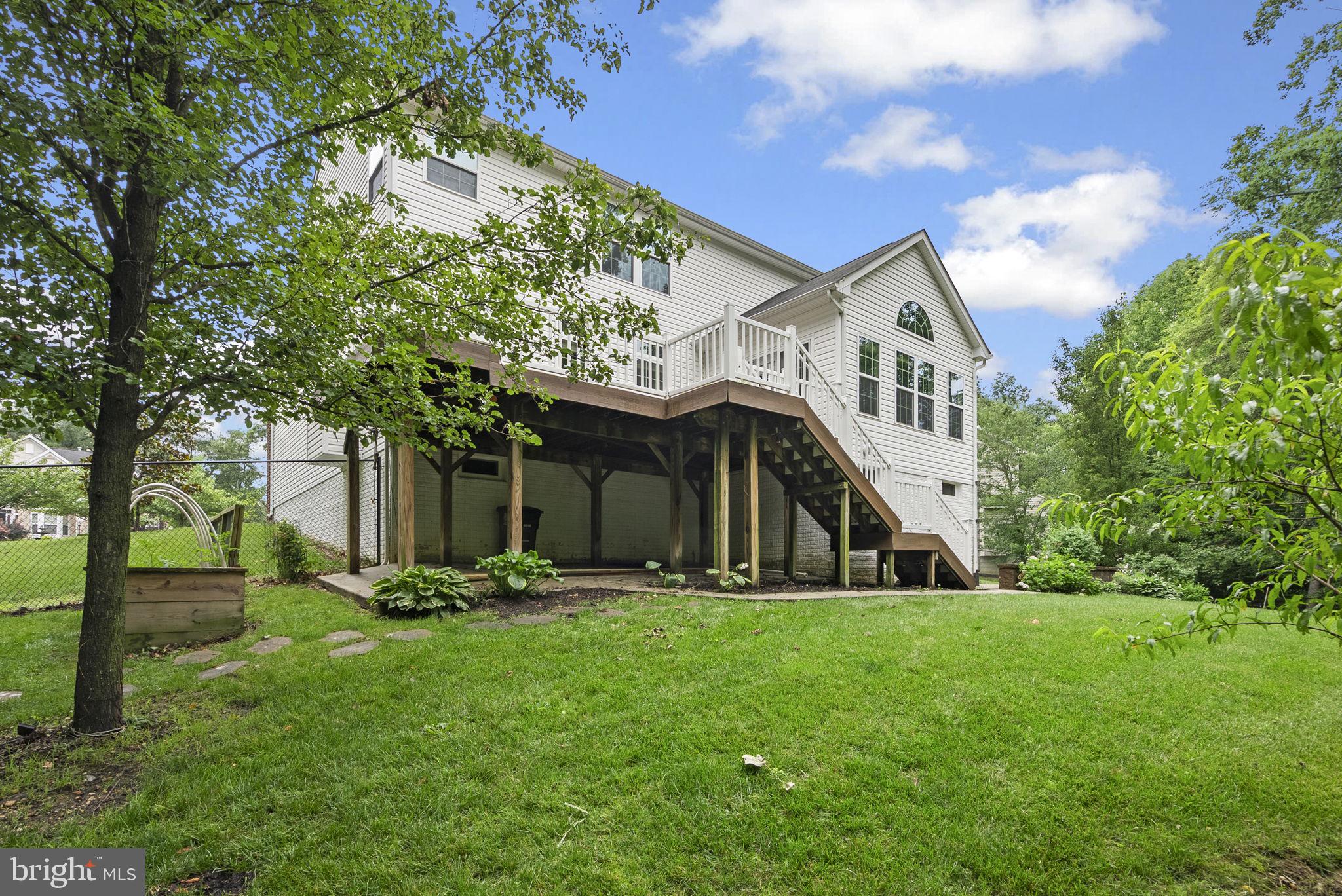 8304 Cedarview Court Clinton, MD 20735 - Photo 34 of 39 a front view of a house with garden