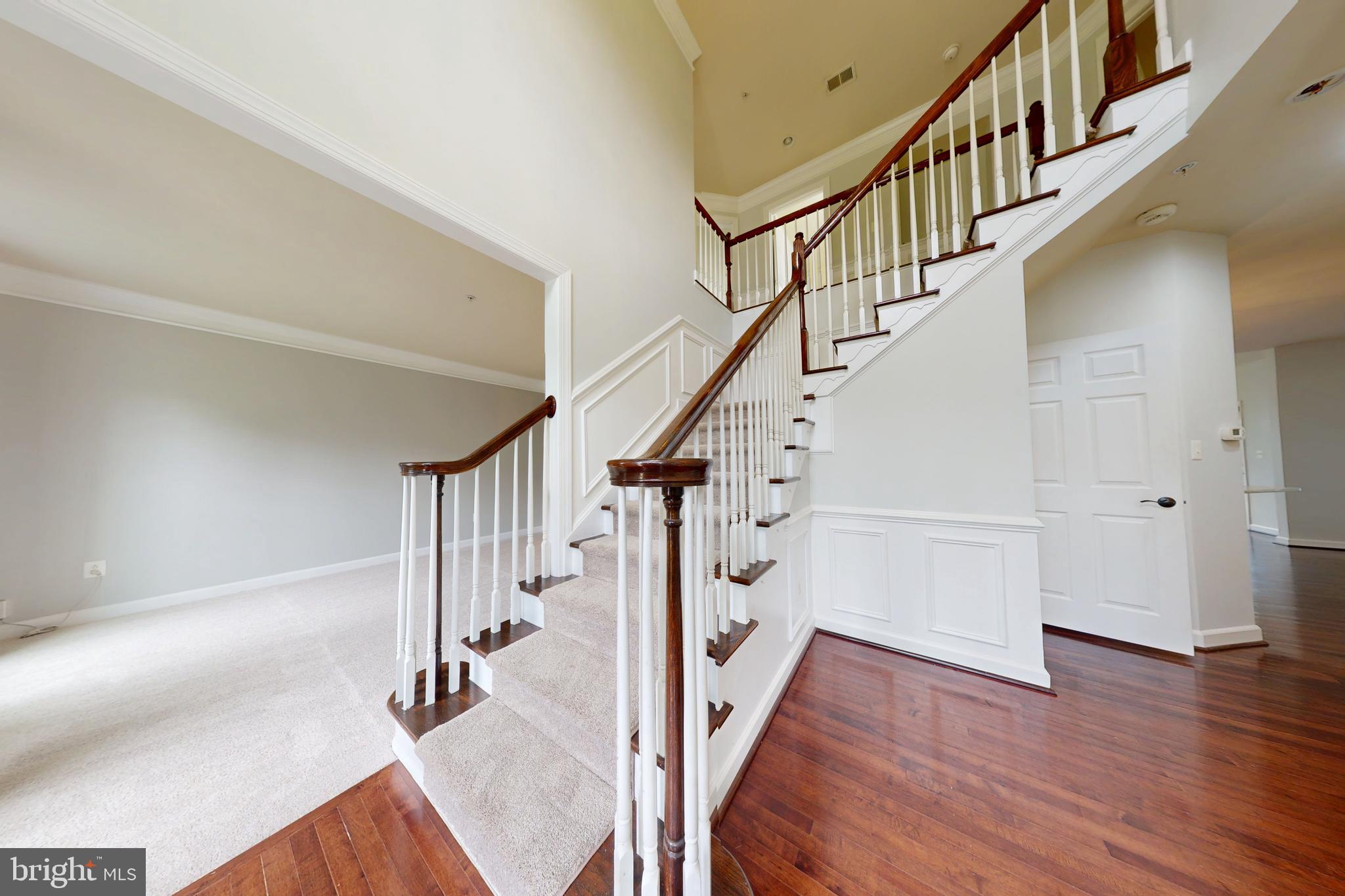 8304 Cedarview Court Clinton, MD 20735 - Photo 4 of 39 a view of entryway and hall with wooden floor